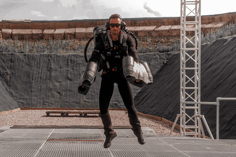 Louis Skupien initiating vertical lift-off in the Gravity Jet Suit during his human flight training session, showcasing advanced wearable aviation technology and real-life Iron Man-style propulsion.